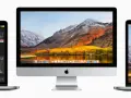 Trzy urządzenia z systemami macOS: iMac z malowniczym krajobrazem na ekranie i dwa laptopy, jeden z edytorem zdjęć, drugi z aplikacją Poczta.