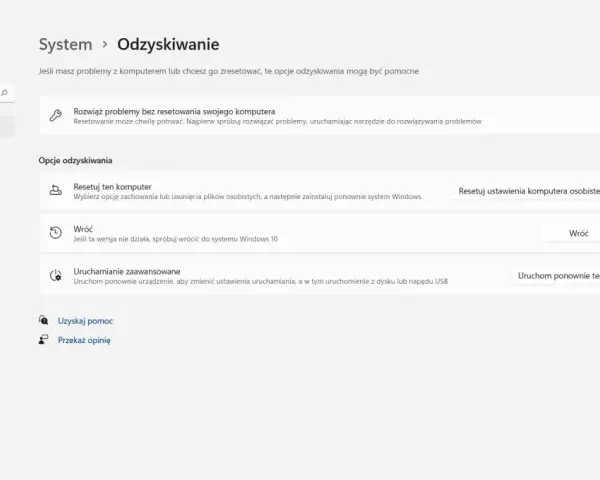 Opcje odzyskiwania systemu Windows. Możesz zresetować komputer, wrócić do Windows 10 lub uruchomić zaawansowane opcje, jeśli chcesz przywrócić system.