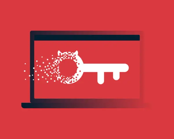 Laptop z kluczem, który rozpada się na piksele. Uważaj na trojan wirus link, który może zaszkodzić Twoim danym.